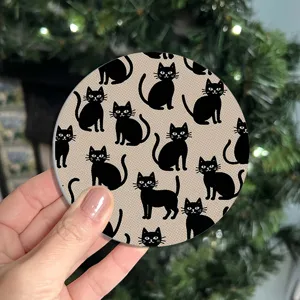Cute black cat pattern silicone absorbent coaster for home coffee and drink table decor.