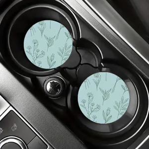 Universelle Auto Becherhalter Untersetzer mit niedlichem grünen Pflanzen Muster auf hellblau.