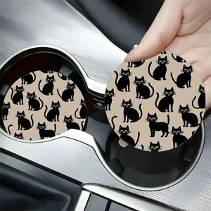 Silicone car cup coaster with cute black cat pattern, non-slip and absorbent for home.