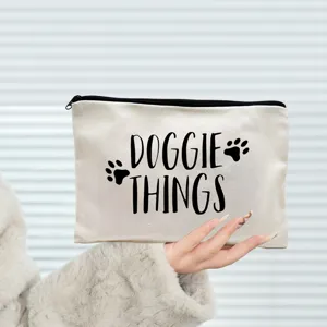 Canvas zipper cosmetic bag with cute doggie things print, perfect for daily storage use.