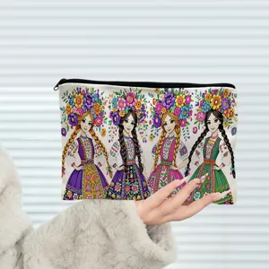 Canvas zipper pouch with floral folk art girls illustration for stationery and makeup storage.