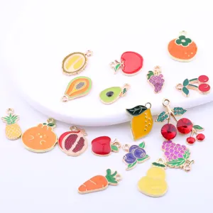 Detailed view of colorful enamel fruit charms collection, perfect for DIY jewelry making.