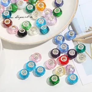 Colorful faceted crystal glass beads with silver core for DIY charm bracelets and jewelry making.