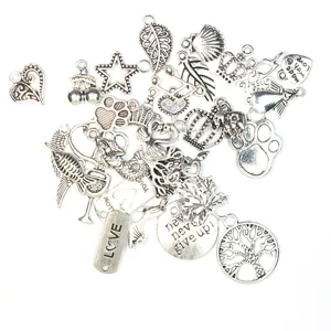 Assorted antique silver alloy DIY charm details, perfect for handmade jewelry making projects.