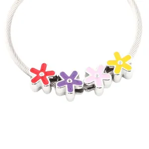 Silver cable wire bracelet with colorful enamel flower beads, perfect for DIY jewelry making.