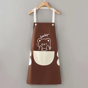 Detailed view of the brown waterproof kitchen apron with cute bear print and large front pocket.
