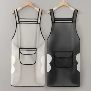 Waterproof TPU apron with pockets and side hand towels for kitchen cooking and restaurant work.