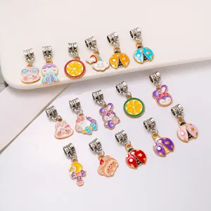 Colorful enamel alloy cartoon charms detail view showing cute animal and fruit pendant designs.