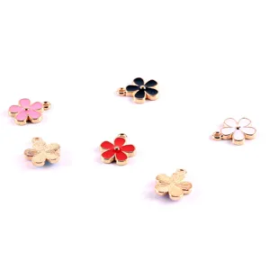 Detail shot of multi-color enamel flower alloy charms, DIY jewelry making pendants.