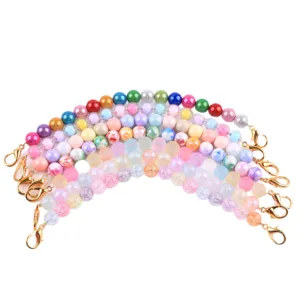 Bracciale di perle in resina colorata 10mm con chiusure a moschettone dorate regalo da donna