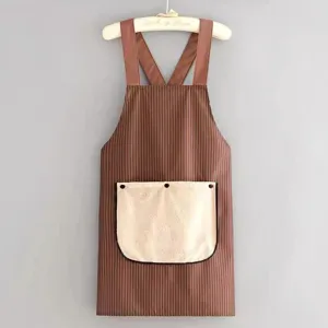 Brown striped waterproof kitchen apron with cross back straps and front pocket for cooking.