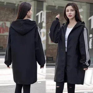 Black long sleeve hooded jacket for women, casual sporty outerwear with white stripes on sleeves.