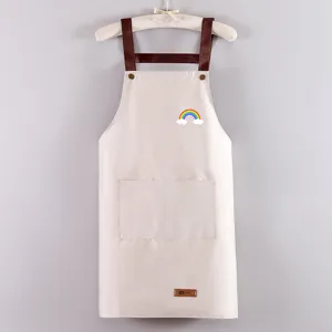 Tablier de cuisine imperméable avec motif arc-en-ciel, bretelles marron et poches avant.
