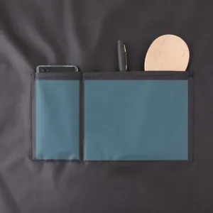 Tablier de cuisine étanche avec deux grandes poches de rangement et emplacement téléphone.