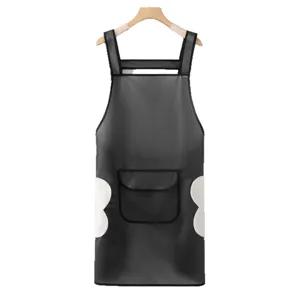 Waterproof black kitchen apron with wiping towels pockets adjustable straps hanging view