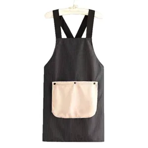 Waterproof kitchen apron with pockets, stylish pinstripe design for home cooking and baking use.