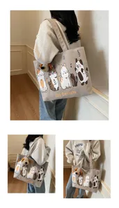 Korean style canvas tote bag with cute cartoon cat print and plush dog pendant for women.