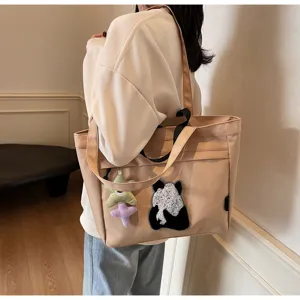 Graziosa borsa a tracolla in tela con ricamo panda per donna, grande borsa shopper elegante.