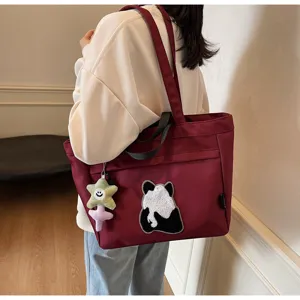 Borsa shopper casual in tela da donna, grande borsa a spalla con ricamo panda e ciondolo.