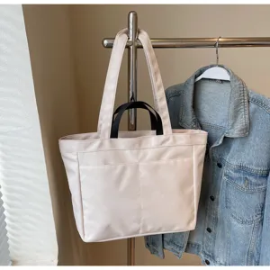 Grande borsa a tracolla in tela borsa tote casual da donna per uso quotidiano.