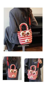 Detail view of casual striped plush bear shoulder bag with red strap and handbag design.