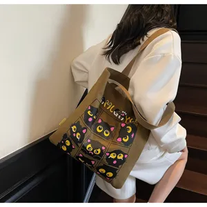 Grand sac cabas en toile avec joli imprimé de chat noir, idéal pour les étudiants au quotidien.