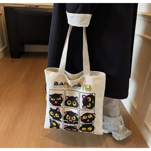 Grand cabas en toile avec imprime de chat noir mignon, ideal pour les etudiants et le quotidien.