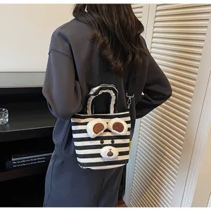 Casual striped canvas tote shoulder bag with cute plush bear decor for women daily use.
