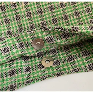 Detailed view of women autumn winter green plaid woolen underarm crossbody bag magnetic closure