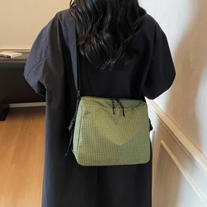 Casual green plaid crossbody bag for women, stylish single shoulder messenger bag daily use.