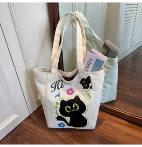 Joli sac cabas en toile chat noir sac à main d'épaule décontracté pour les voyages et le shopping.
