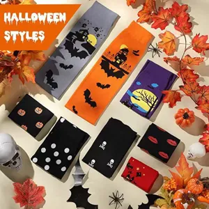 Halloween party festival long socks set with assorted bat pumpkin skull patterns and spooky themes.