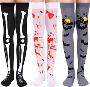 Halloween over-the-knee socks detail view, featuring skeleton, blood, and bat prints for party costumes.