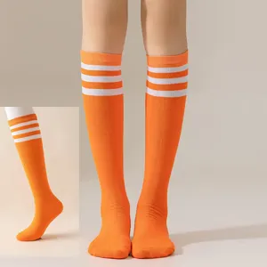Orange knee high socks with white stripes, perfect for daily wear, JK uniform and parties.