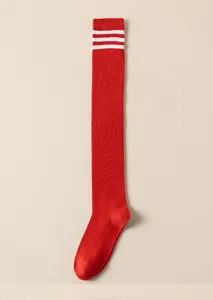 Red over-the-knee socks featuring white stripes, ideal for Japanese JK cosplay and daily preppy wear.