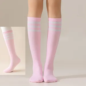 Pink knee high socks with three white stripes, perfect for cosplay, school uniform, and daily wear.