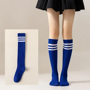 Women Japanese JK style over-the-knee high socks with classic three white stripes design.