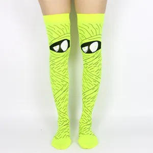 Calcetines altos de momia para Halloween, medias verde neón con ojos divertidos para fiesta.