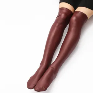 Glossy faux leather thigh-high stockings for women, dark red over-the-knee shiny socks.