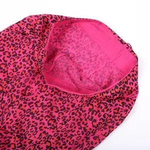 Hot pink leopard print pantyhose detail view, sexy sheer tights for clubwear and parties.