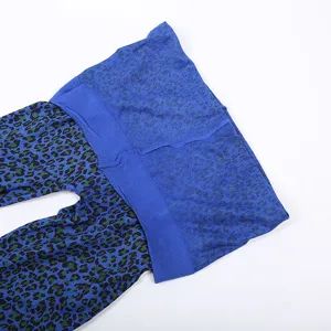 Blue leopard print tights detail view, stylish hosiery for women, fashion party legwear.
