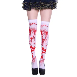 Detail view of Halloween blood print over-the-knee socks, featuring bold red splatter patterns.