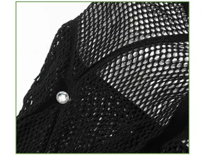 Close-up detail of black fishnet pantyhose with sparkling rhinestone accent, sexy mesh style.