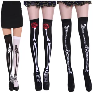 Detailed view of Halloween skeleton print over knee socks with bone and floral patterns.