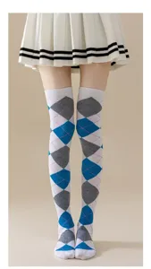 Argyle pattern detail of women over-the-knee long socks, classic winter daily wear knit hosiery style.