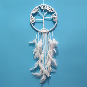 White tree of life dreamcatcher wall hanging, handmade feather decor for bedroom and room design.