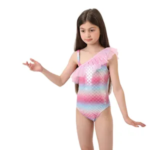 Cute pink sequin mermaid swimsuit for girls, colorful fish scale one-piece with ruffles.