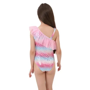 Girls colorful mermaid scale one-piece swimsuit with pink shoulder ruffle, back view main image.