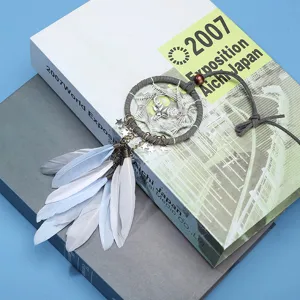 Dreamcatcher car hanging ornament with feathers and deer charm for auto interior decor style.