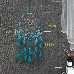 Detail view of blue Indian style feather dream catcher hanging on wall with size specs.